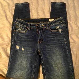 Dark blue distressed skinny jeans bridge by gly